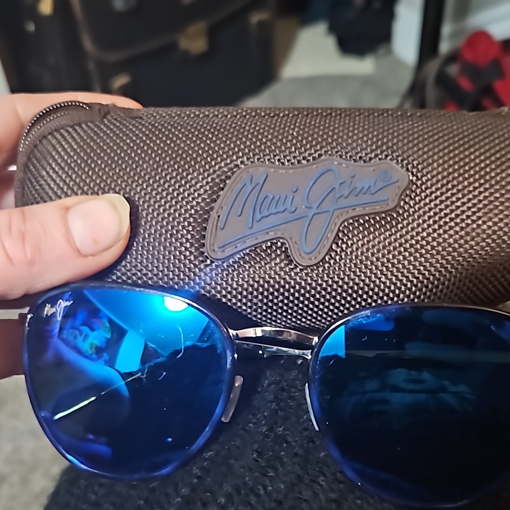 Men's Maui Jim sunglasses with blue lenses